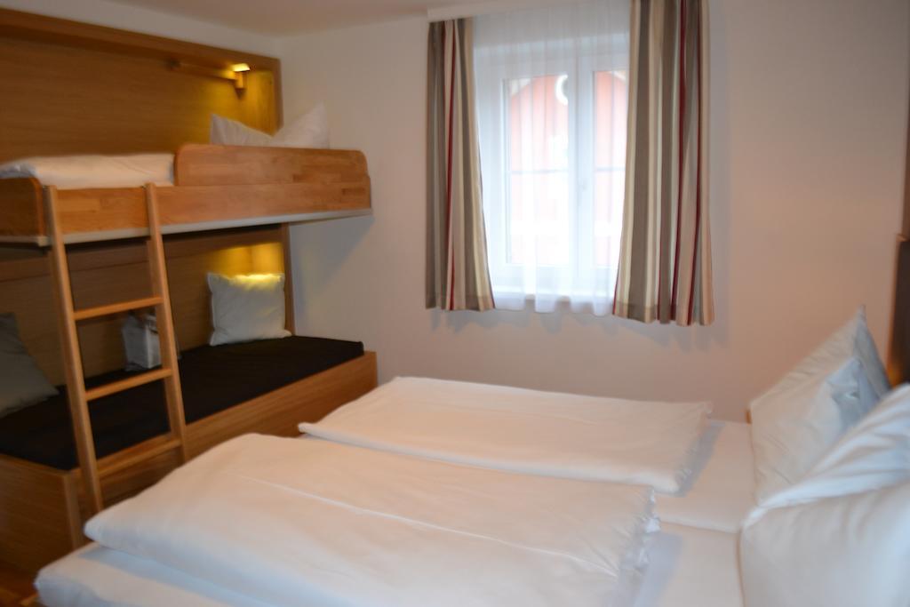 Hotel Gasthof Tirolerwirt Бішофсгофен Номер фото